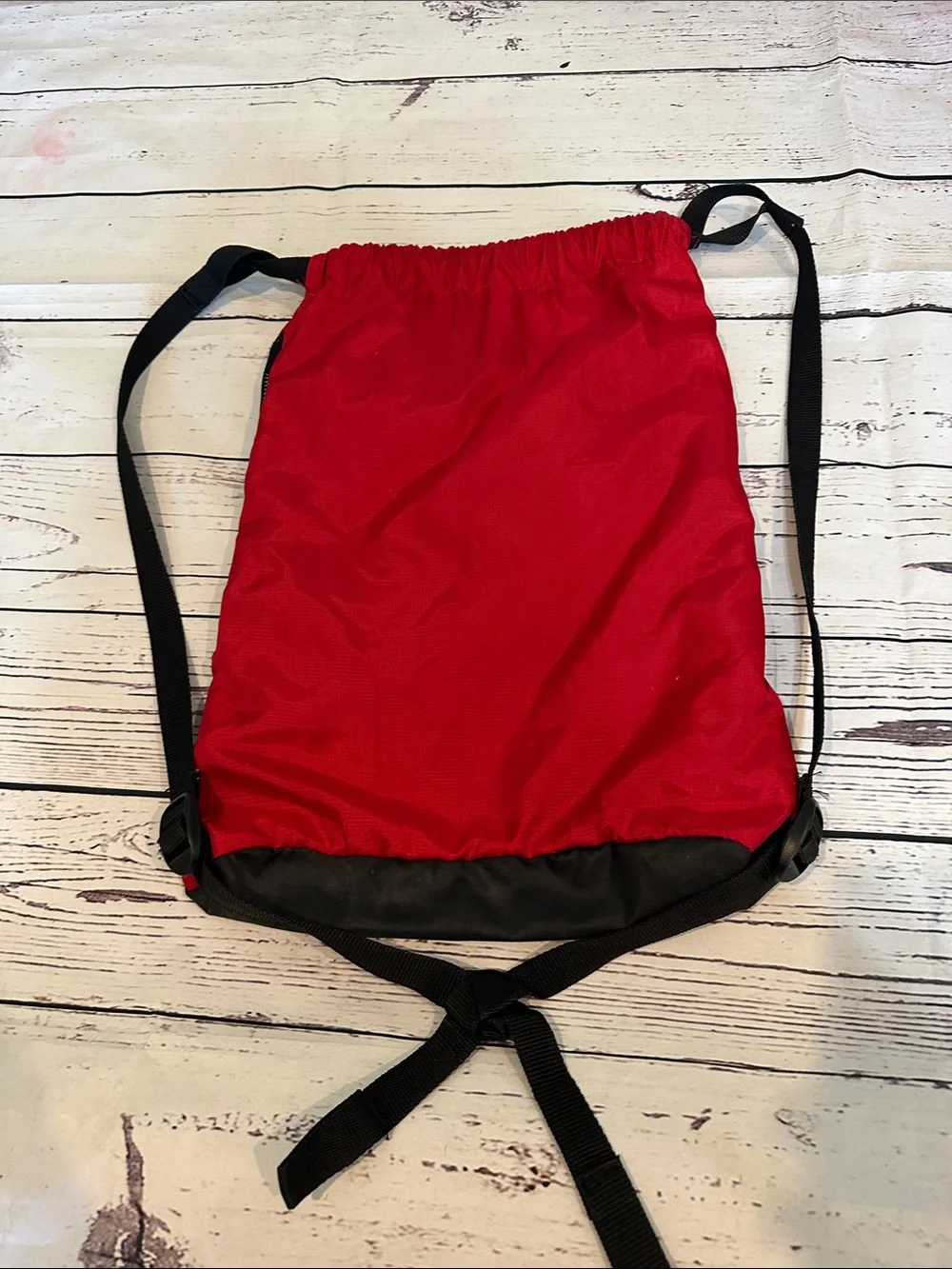 Nike Red and Black Drawstring Backpack with White Swoosh